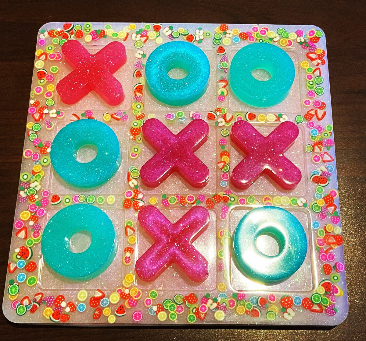 The Fruity Pebble Tic Tac Toe board