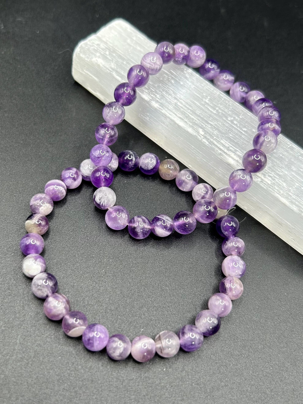 Amethyst, calms the mind, boost intuition and protects your energy (1 per order)