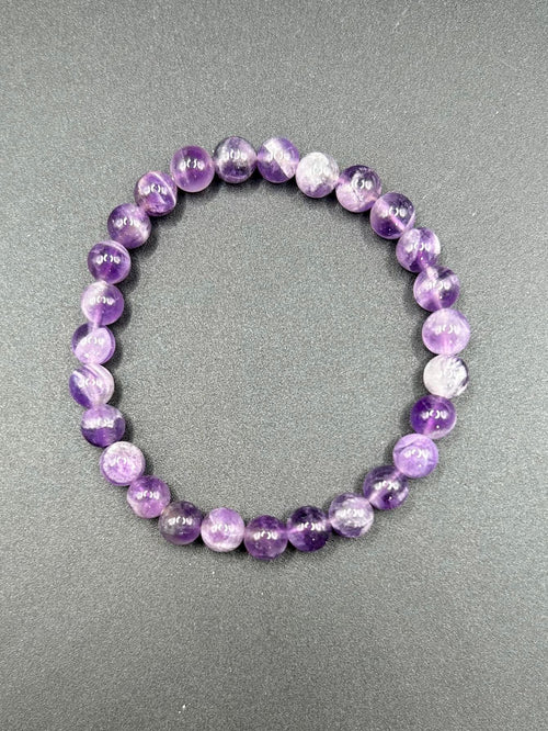 Amethyst, calms the mind, boost intuition and protects your energy (1 per order)
